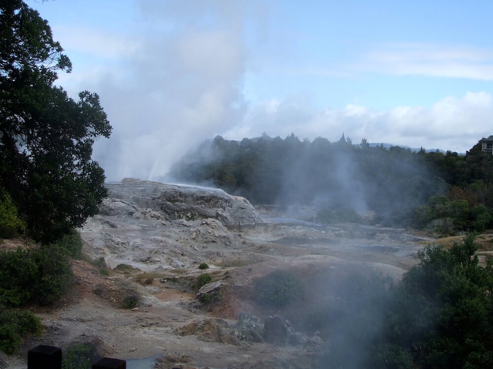 Whakarewarewa Thermal Village view to Four Feathers Geyser Whakarewarewa Thermal Village view to Four Feathers Geyser