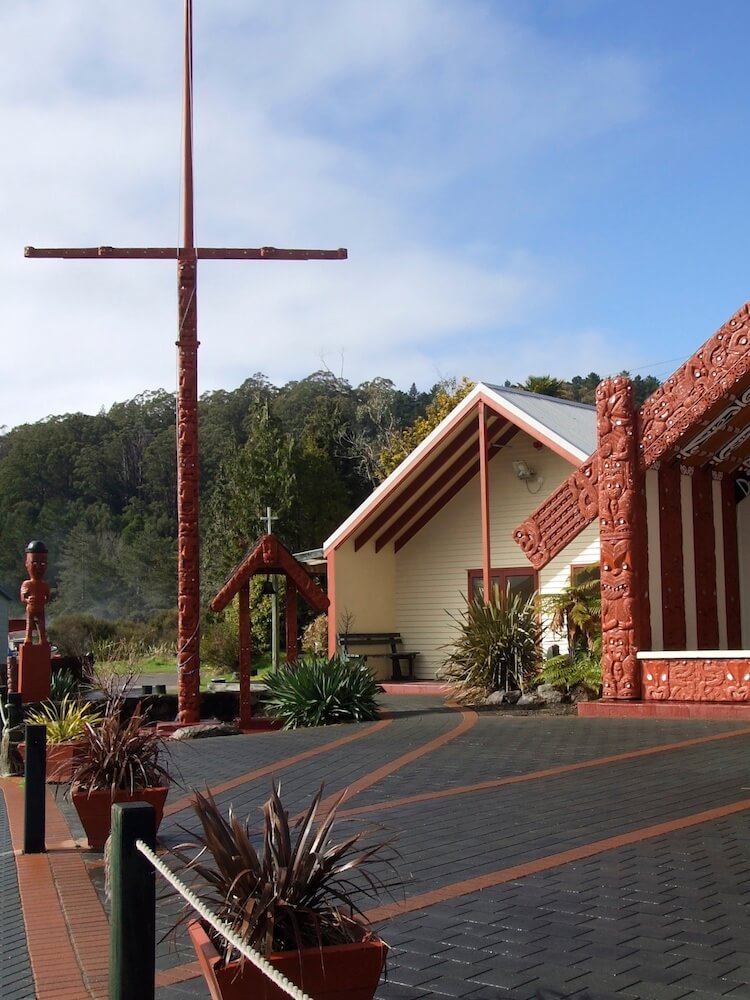 Whaka Village poupou dedicated by a Japanese officer before the war.