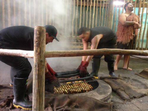 Tamaki Māori Village hangi being uplifted