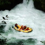 White water rafting Rotorua - Raft disappearing into the water