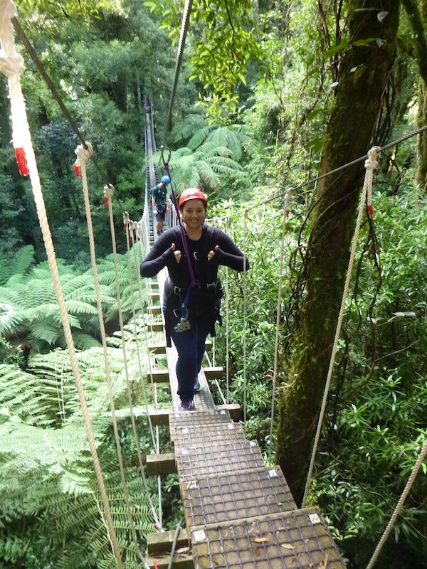 Writer's daughter Elise on a swingbridge at our Rotorua Canopy Tours experience.