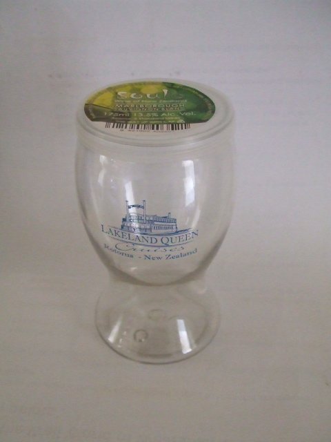 Lakeland Queen's branded wine glass.